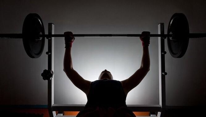 A man with the bar